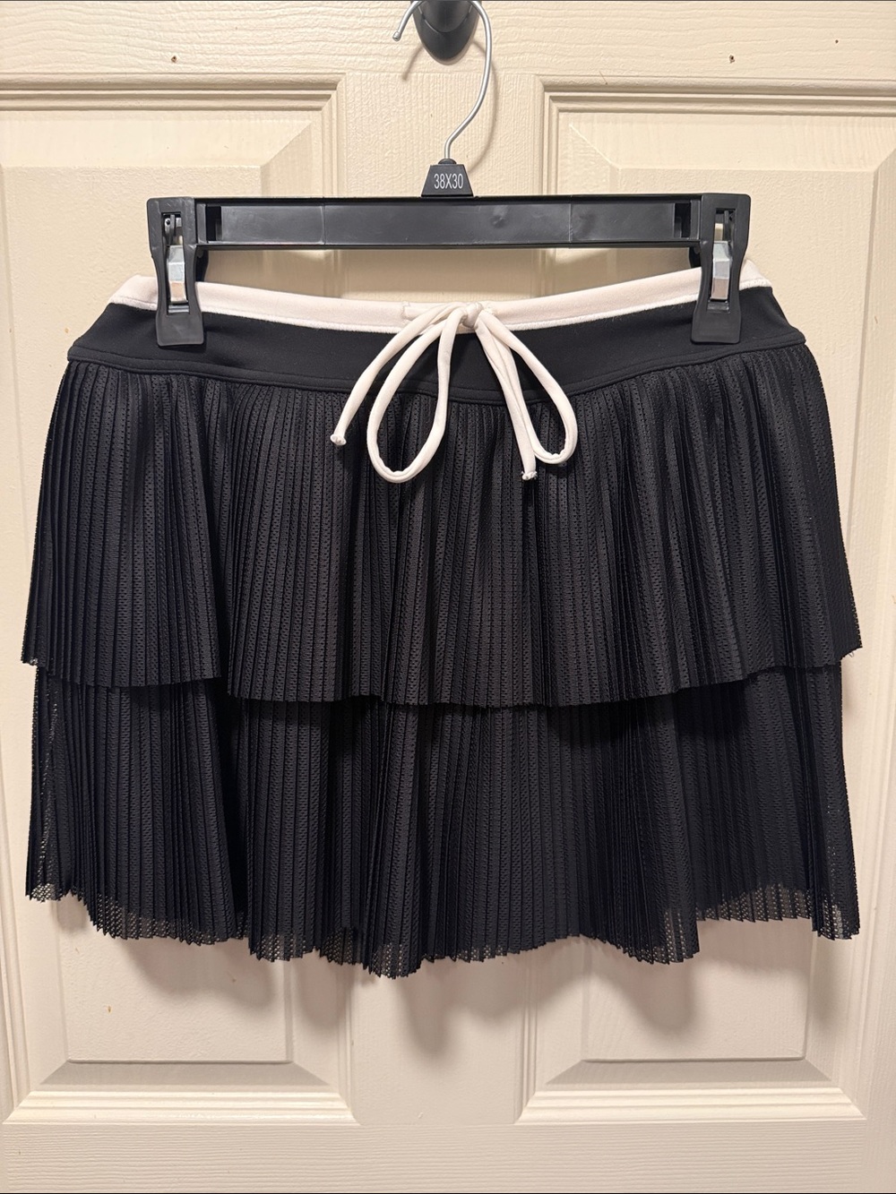 Offline by aerie mesh pleated tiered skort with white waistband.